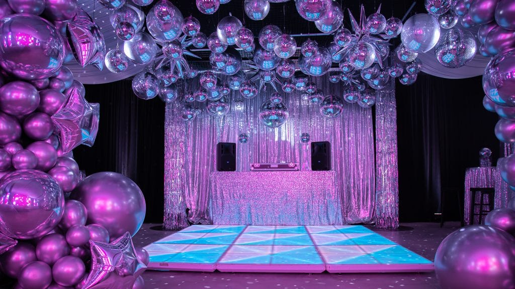 70s silver disco theme led dance floor and silver mirror balls 70's disco theme decorating ideas