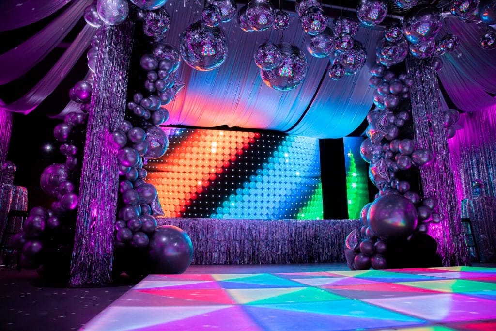 70s silver disco theme illuminated LED dance floor and mirror balls - styling a disco party