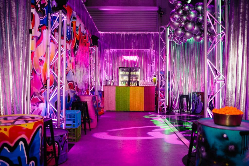 Graffiti themed party, themed backdrops, bar area, graffiti drums Graffiti party theme inspiration