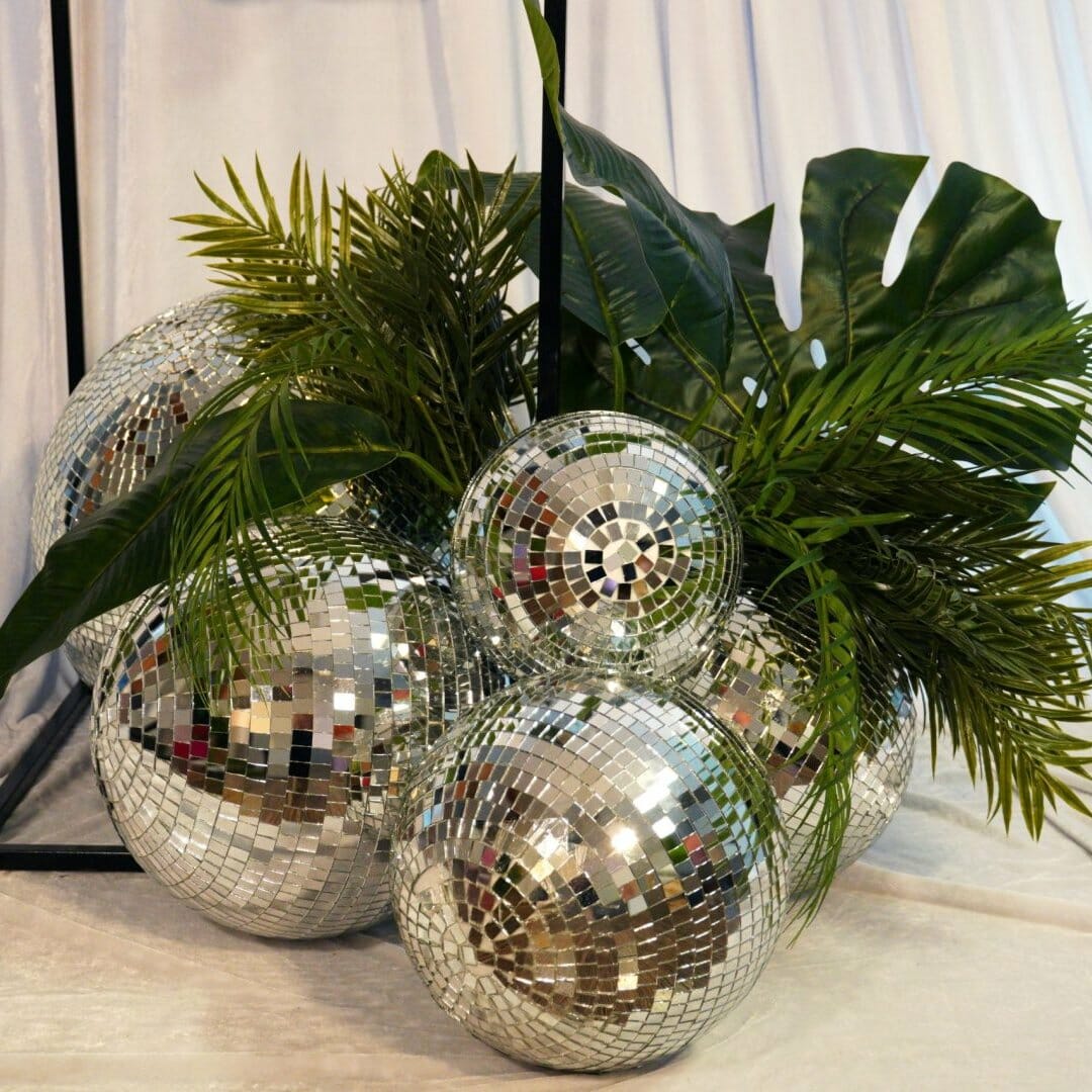 silver mirror balls and greenery