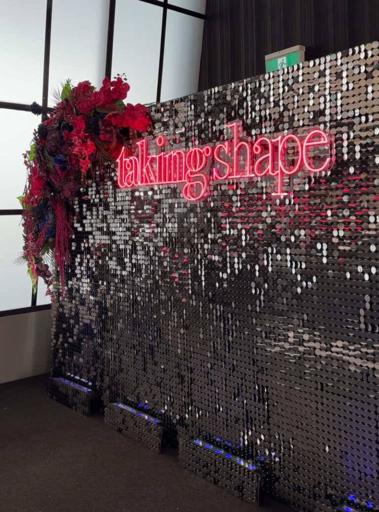 Taking Shape end of year party 2024 Silver Sequin Backdrop Floral Backdrop Backdrop Hire Melbourne