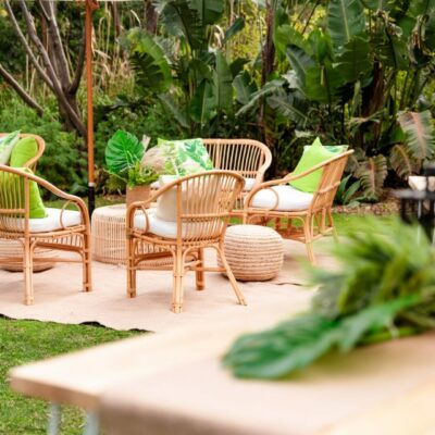 Rattan furniture setup at the secret garden at werribee zoo