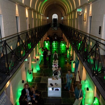 Crocs 2023 Trade Show - overhead shot of venue featuring illuminated furniture and crocs products