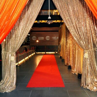 drape and red carpet entranceway