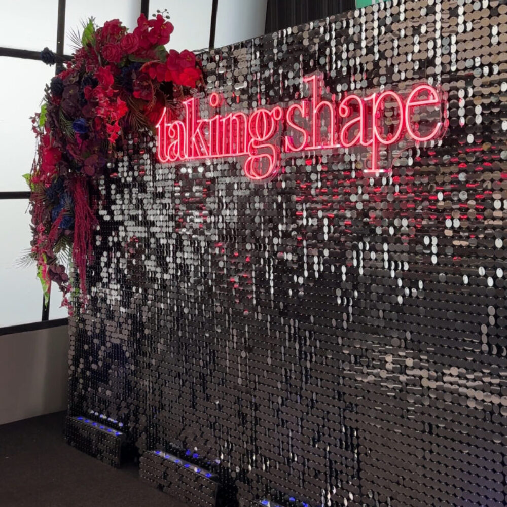 Taking Shape end of year party 2024 Silver Sequin Backdrop Floral Backdrop Backdrop Hire Melbourne