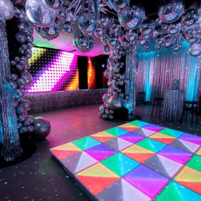 Silver 70s disco party illuminated LED dance floor Popular party theme ideas