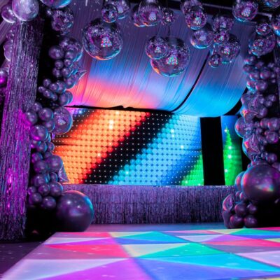 70s silver disco theme illuminated LED dance floor and mirror balls - styling a disco party